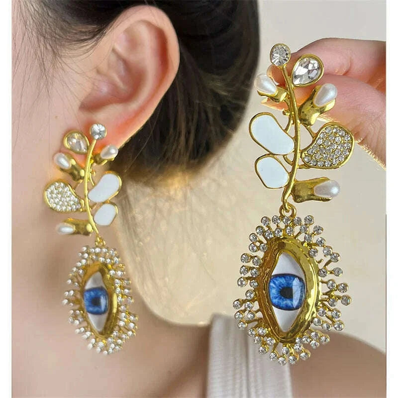 European and American retro court style leaf earrings, niche design, demon's eye, light luxury temperament, long earrings