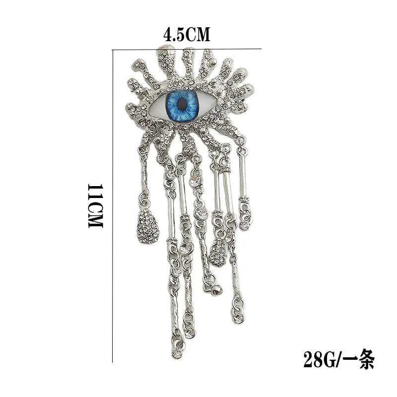 Retro Eye Shaped Rhinestone Brooch for Women and Men Tassel Chain Lapel Pins Badge Elegant Fashion Jewelry Accessories