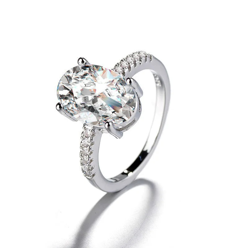 Elegant Geometric Oval Ring Crafted in Copper with Inlaid Zircon Stones Ideal for Fashion-Forward Women Seeking Light...
