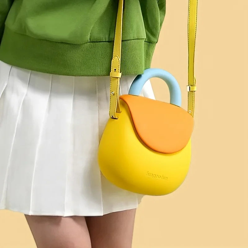 The new, cute, portable phone handbag with shoulder strap is stain-resistant and features a gourd design for cross-body carrying