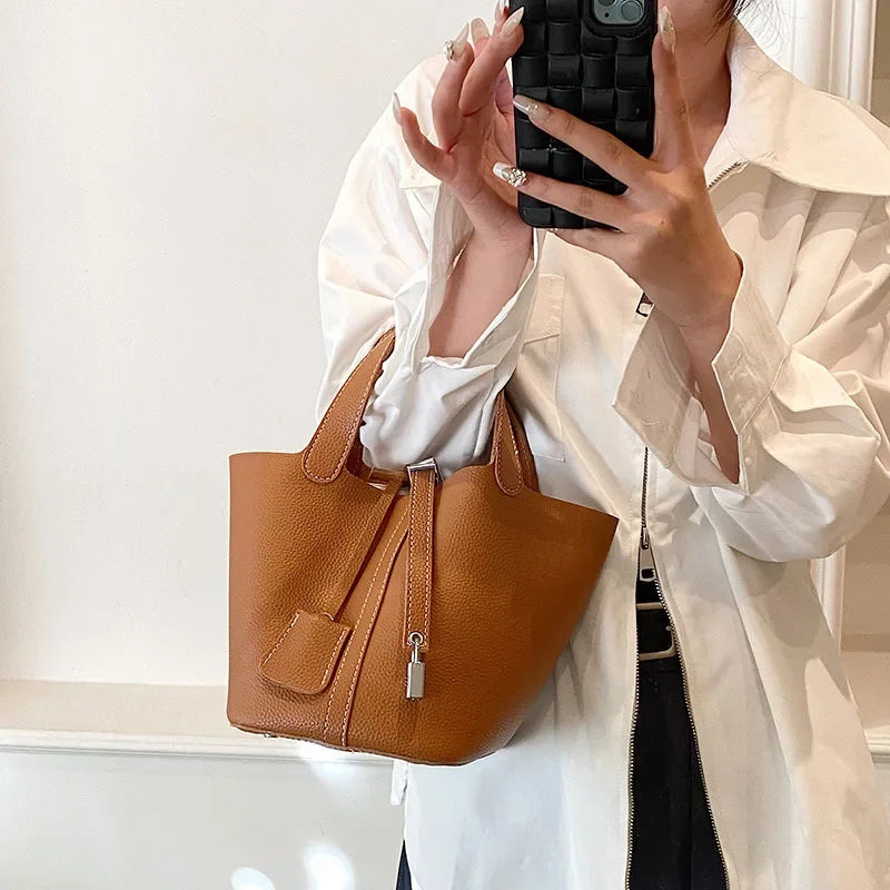 Fashionable 2023 New Women's Handbag Vintage Bucket Bag Niche Design High-end Feel Simple Tote Bag Waist Packs | Kimlud...