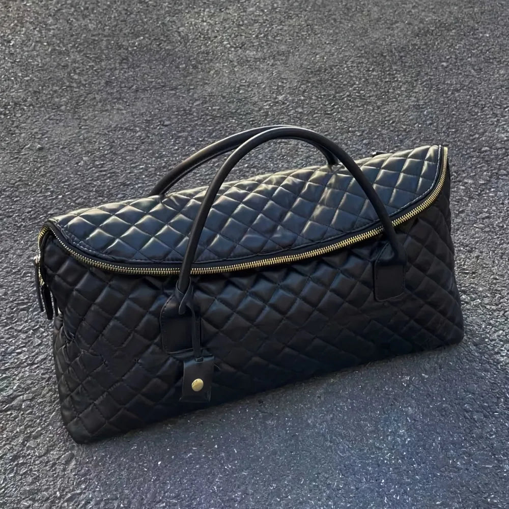 Stylish Vintage Black Quilted Handbag With Exquisite Gold‑Toned Hardware And Lock Details. Spacious And...