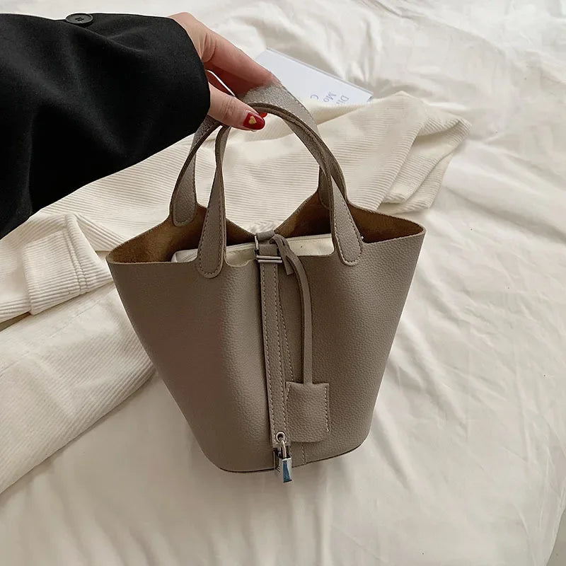 Fashionable 2023 New Women's Handbag Vintage Bucket Bag Niche Design High-end Feel Simple Tote Bag Waist Packs | Kimlud...