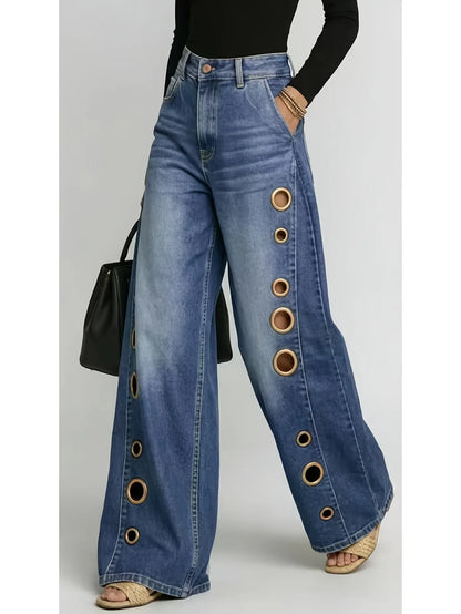 Retro-style wide-leg jeans with metallic eyelets, high-waisted, loose, floor-length fit, gradient eyelets of varying...
