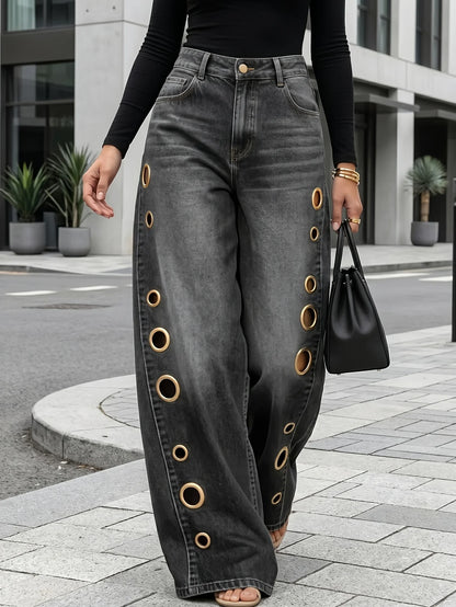 Retro-style wide-leg jeans with metallic eyelets, high-waisted, loose, floor-length fit, gradient eyelets of varying...