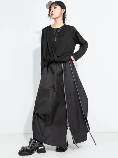 [EAM] High Elastic Waist Black Irregular Slit Casual A‑Line Half‑body Skirt Women Fashion Tide New Spring Autumn 2026...