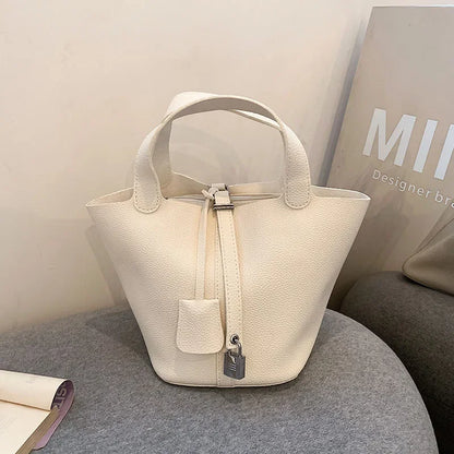 Fashionable 2023 New Women's Handbag Vintage Bucket Bag Niche Design High-end Feel Simple Tote Bag Waist Packs | Kimlud...