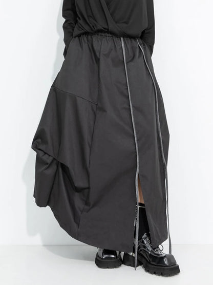 [EAM] High Elastic Waist Black Irregular Slit Casual A‑Line Half‑body Skirt Women Fashion Tide New Spring Autumn 2026...