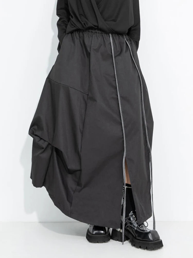 [EAM] High Elastic Waist Black Irregular Slit Casual A‑Line Half‑body Skirt Women Fashion Tide New Spring Autumn 2026...