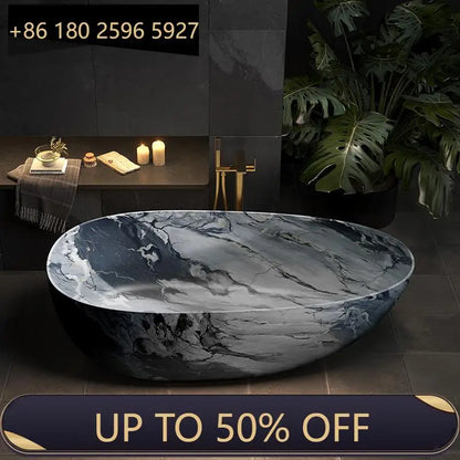 Luxury marble-patterned freestanding bathtub, oval-shaped artificial stone soaking tub, suitable for hotels and villas.
