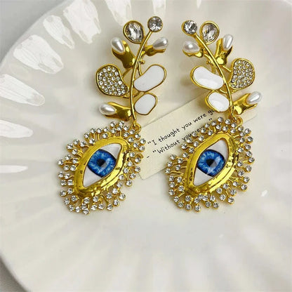 European and American retro court style leaf earrings, niche design, demon's eye, light luxury temperament, long earrings
