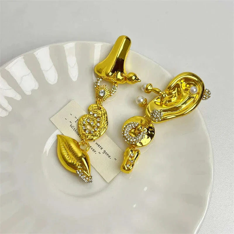 European and American retro court style leaf earrings, niche design, demon's eye, light luxury temperament, long earrings