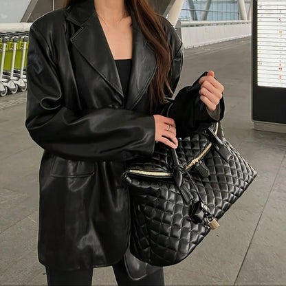 Stylish Vintage Black Quilted Handbag With Exquisite Gold‑Toned Hardware And Lock Details. Spacious And...