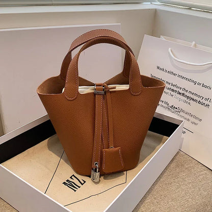 Fashionable 2023 New Women's Handbag Vintage Bucket Bag Niche Design High-end Feel Simple Tote Bag Waist Packs | Kimlud...