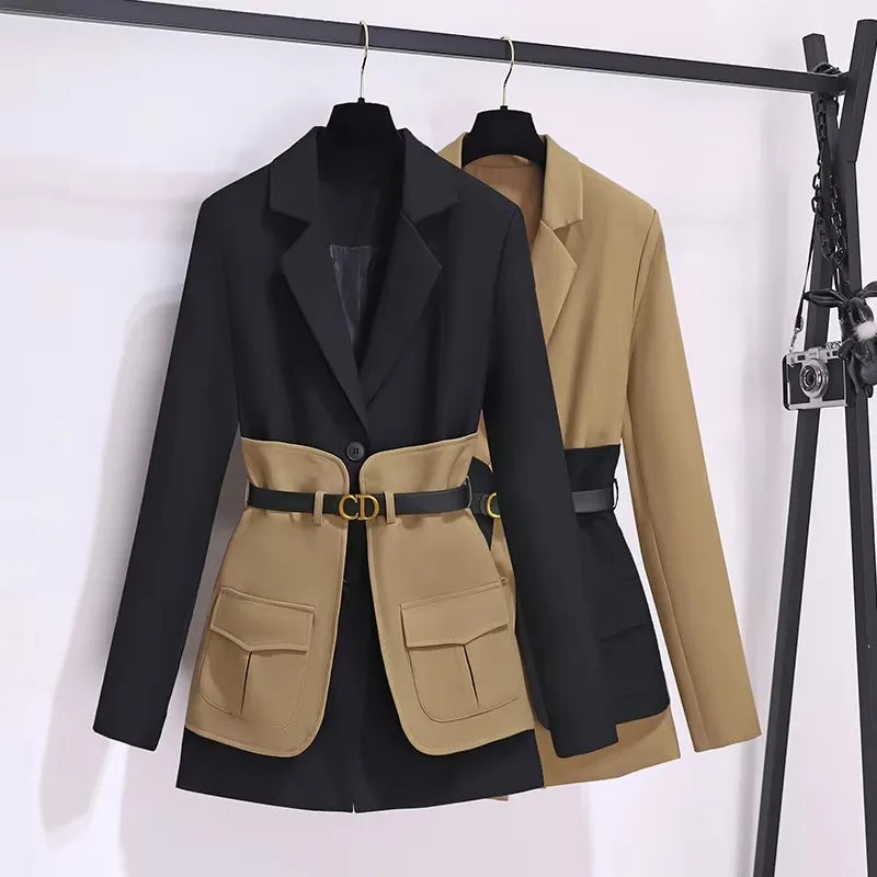 Two jackets, one black and one beige with a belt, on hangers against a white background.
