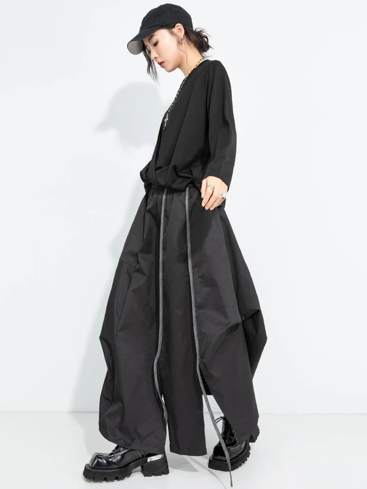 [EAM] High Elastic Waist Black Irregular Slit Casual A‑Line Half‑body Skirt Women Fashion Tide New Spring Autumn 2026...