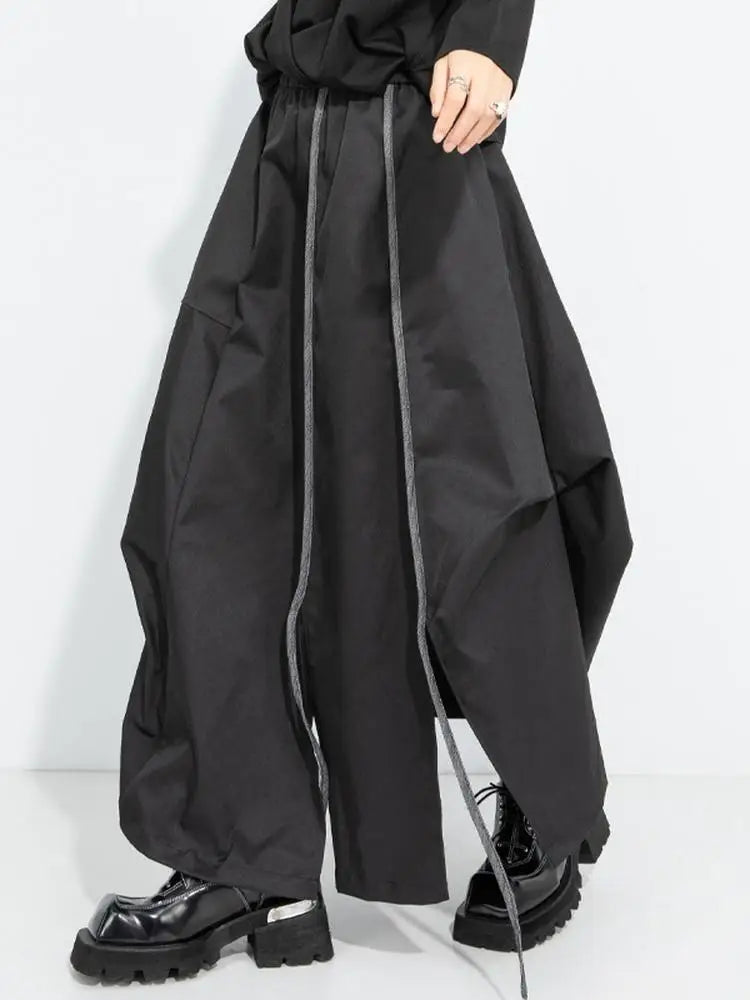[EAM] High Elastic Waist Black Irregular Slit Casual A‑Line Half‑body Skirt Women Fashion Tide New Spring Autumn 2026...