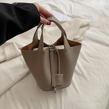 Fashionable 2023 New Women's Handbag Vintage Bucket Bag Niche Design High-end Feel Simple Tote Bag Waist Packs | Kimlud...